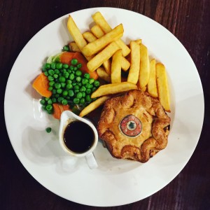 Typical gastropub food. Steak and ale pie with chips.